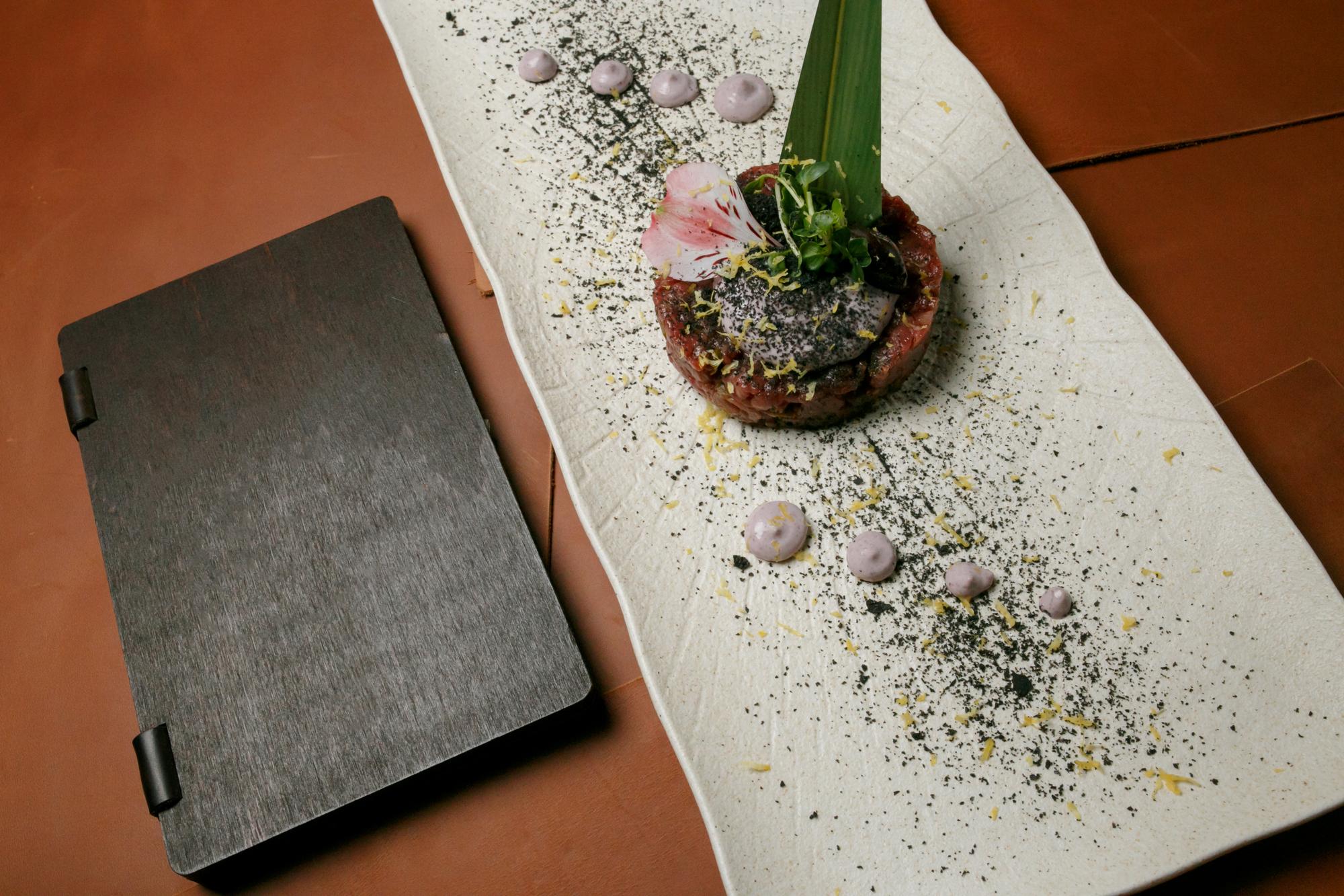 Tasting menu sample on slate board